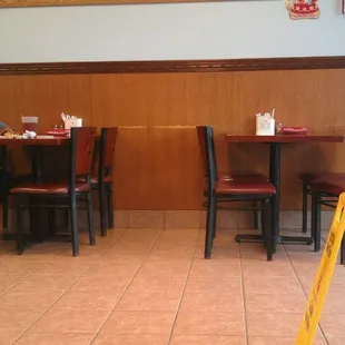 a man sitting at a table in a restaurant