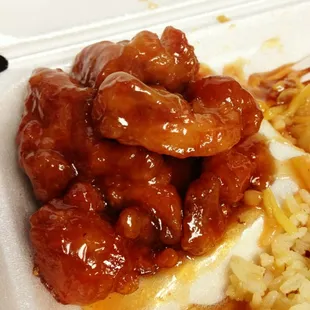 Orange chicken. Not heavily breaded like most places. Sooo good! That sauce is amazing.