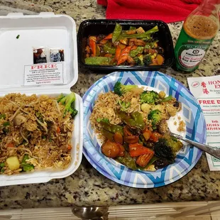 Fried rice on left side order of vegetable back right.  Great home delivery fast and order is correct.