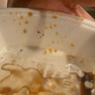 a dirty bowl of food