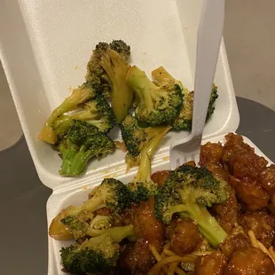 broccoli and noodles in a styrofoam container