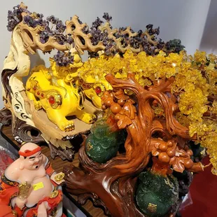 a display of fruit and figurines