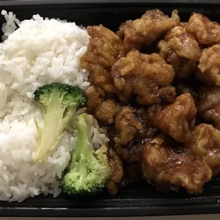 General tso&apos;s chicken combo platter with white rice (standard comes with pork fried rice). Served with one pork egg roll for $7.75