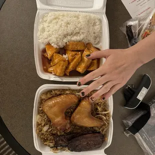 Orange tofu and chicken friend rice with beef teriyaki and chicken wings. Hand for size.