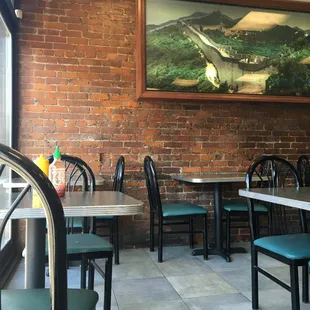 Great full length glass doors to people watch.