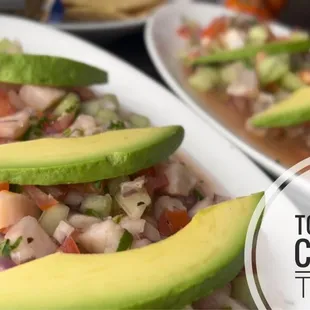 a plate of food with avocado