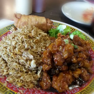 General Tso&apos;s chicken with chicken fried rice and egg roll.  Lunch special.