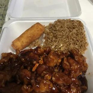 Orange chicken dinner combo with fried rice and an egg roll