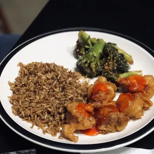 Fried rice, sweet and sour chicken, broccoli in brown sauce