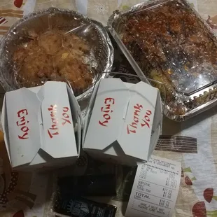 two trays of food on a table