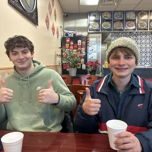the boys enjoying their water before their soup