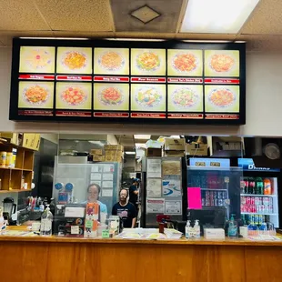 a restaurant counter with menus