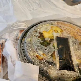 a dirty pan with food in it
