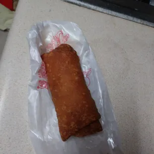 This is what they serve. This burnt up mess .. They rude and not welcoming ... At this store .. And they have ROACHES . big ones ....