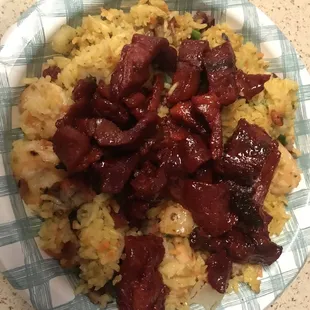 Boneless spareribs tips over pork fried rice with shrimp...