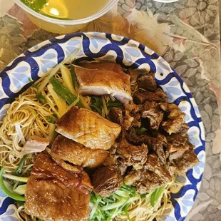 $18 Tossed Noodle w/ Stewed Beef &amp; Duck... +$ Ginger &amp; Green Onion, +$ xtra Noodles, +$ Large Soup.  Kitchen accommodated all requests.