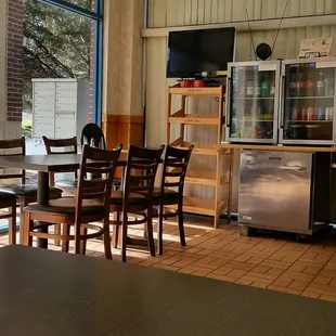 a table and chairs in a restaurant