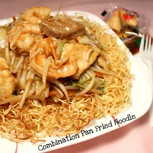 a plate of stir fried noodles