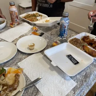 a table full of food and drinks