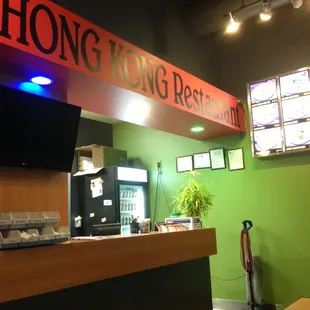 a woman sitting at the counter