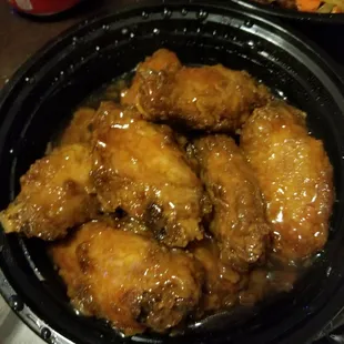 Honey chicken wings - soggy and soaked in gooey honey