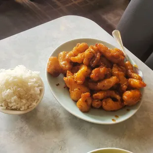 Mandarin Chicken entree with side of steamed rice.