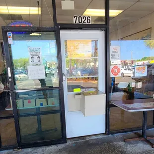 Interesting Covid precautions! No entry, and  a nice dropbox style delivery system.