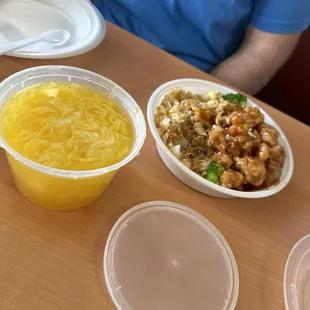 Pint of egg drop soup and general tso&apos;s lunch plate with fried rice