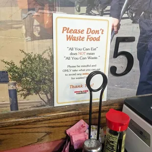 a don't waste food sign