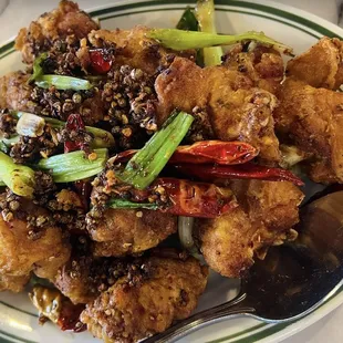 Szechuan spicy chicken bone in