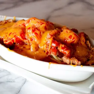 Baked pork chop with spaghetti in tomato sauce