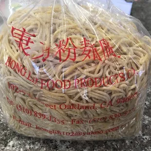 Uncooked thick egg noodles. $3.85/5 lbs