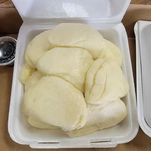 Side order bunbao to go with the roast duck platter I ordered.