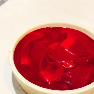 a bowl of red liquid