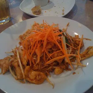 a plate of stir fried noodles