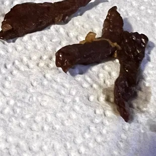 a couple of dried fish in the snow