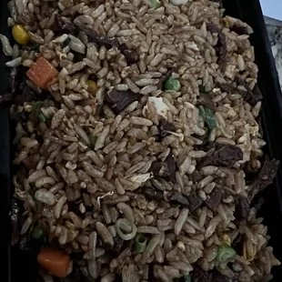 Looks like squid ink rice!!!  WHERE&apos;S THE  BEEF!
