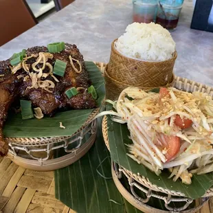 Kook kai chicken, sticky rice and papaya salad