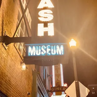 a neon sign for a cafe