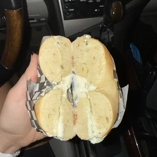Toasted plain bagel with lemon dill cream cheese.