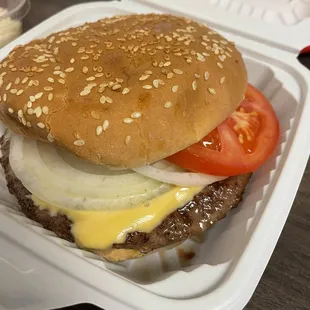 Cheeseburger. It&apos;s huuuuge! Cooked medium, so not dry at all! Just wished it had pickles (not possible, I asked)