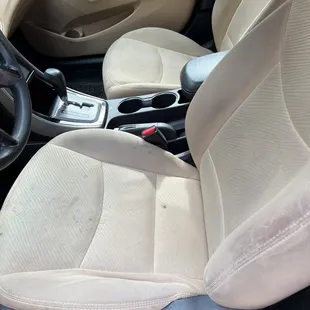 Dirty stained drivers seat
