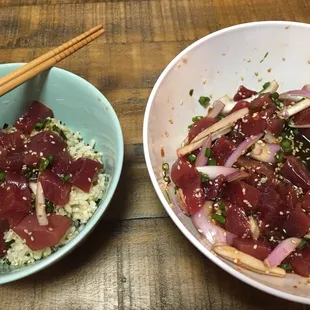 two bowls of food with chopsticks