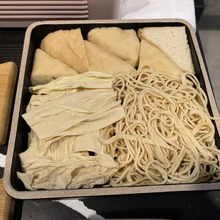 V3: Fried Tofu Puff, Bean Curd Sticks, and Bean Curd strips (almost noodle-like in length)
