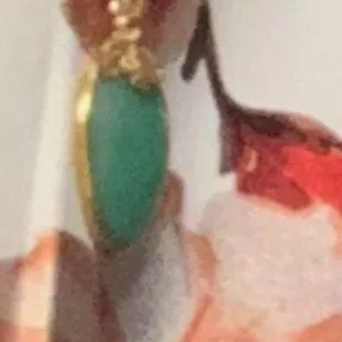 looking for this stolen on 11/29/22 jade pendant. 808-38-6139