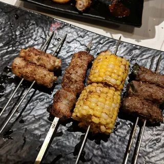 P7. Pork Wrapped Enoki