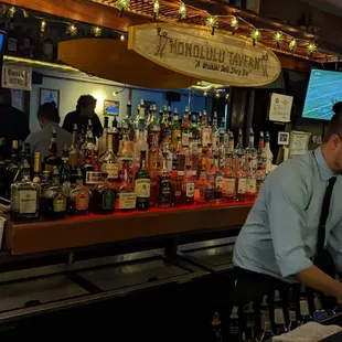 a bartender at the bar