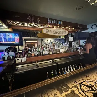 a woman at the bar
