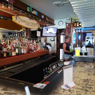 The whole bar. There is something that does belong in this picture, can you find it?