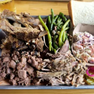3 meat deal, pulled pork so soft. Rubs fall off bone, brisket...omg...better than Famous Dave's.!